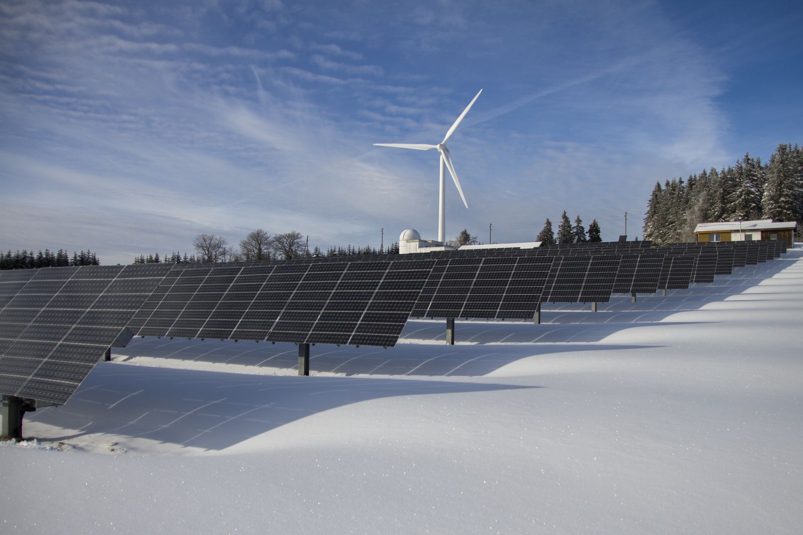 Solar array standing in a wide open landscape